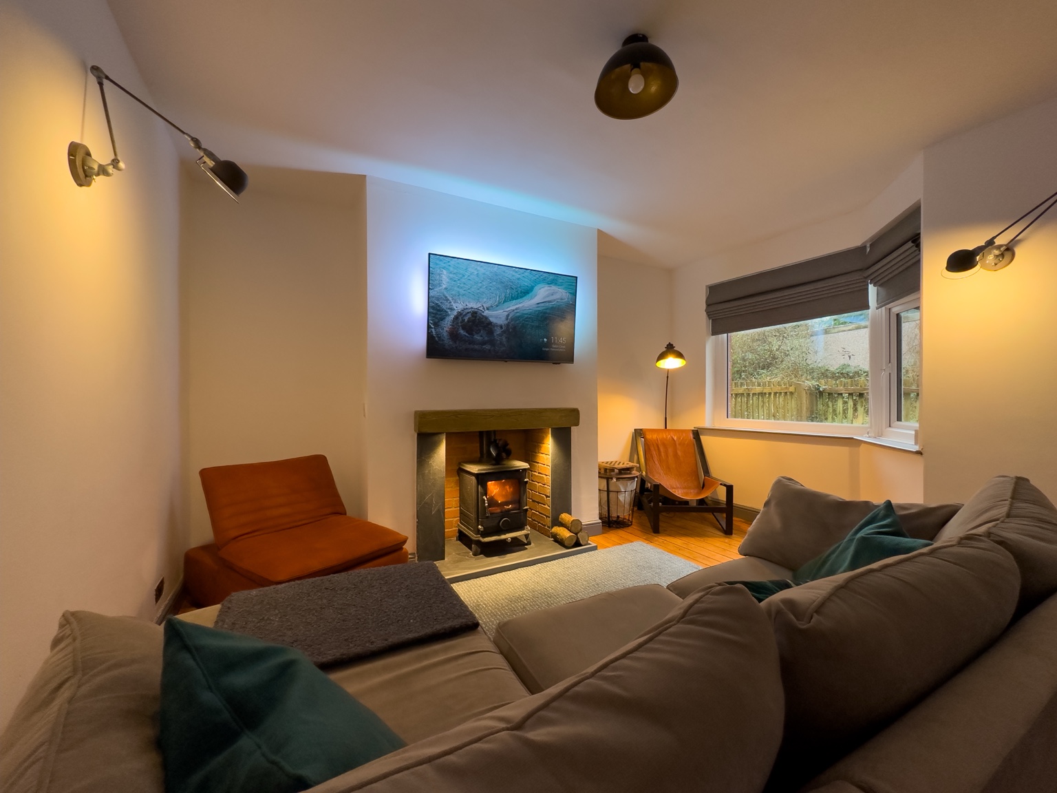 Living room with lit stove